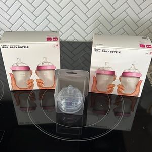 Comp Tomo baby bottles and nipples